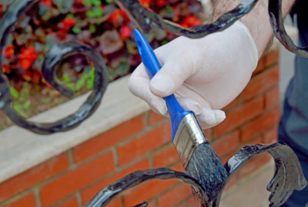 Detailed Rust Removal and Painting Plan for Ornate Ironwork with Scrollwork
